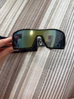 Oakley Black Frame Sunglasses with Green Mirrored Lenses